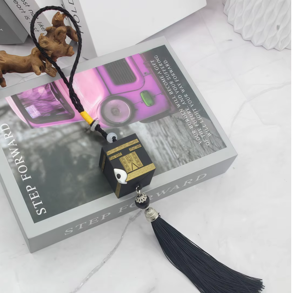 image of a kabah shaped car charm