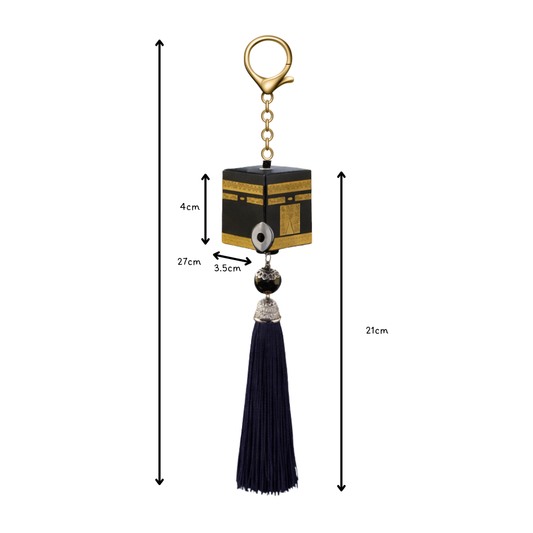 Keychain with Kaaba model and tassel, showing measurements on a white background